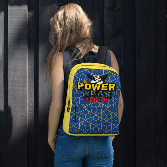 Person wearing a blue and yellow backpack with 'Define your power' text against a dark background