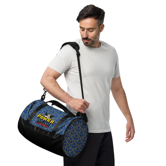 Man holding a blue and black duffel bag with 'Power Training' logo on a white background